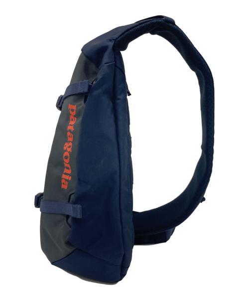 Patagonia（パタゴニア）Patagonia (パタゴニア) アトムスリング8L ボディーバッグ ネイビー×オレンジの古着・服飾アイテム