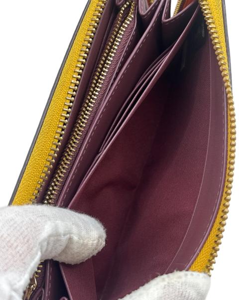 COACH（コーチ）COACH (コーチ) 長財布 イエローの古着・服飾アイテム