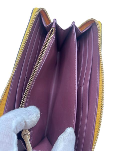 COACH（コーチ）COACH (コーチ) 長財布 イエローの古着・服飾アイテム