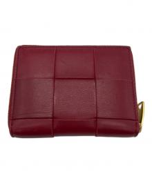 BOTTEGA VENETA（ボッテガベネタ）の古着「スモールカセット ラウンドファスナー財布」｜レッド