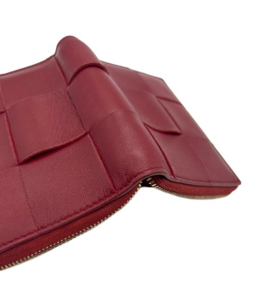 BOTTEGA VENETA（ボッテガベネタ）BOTTEGA VENETA (ボッテガベネタ) スモールカセット ラウンドファスナー財布 レッドの古着・服飾アイテム