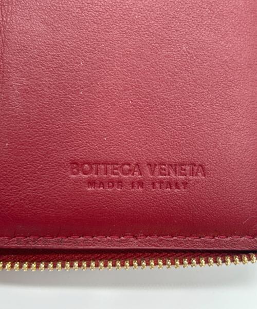 BOTTEGA VENETA（ボッテガベネタ）BOTTEGA VENETA (ボッテガベネタ) スモールカセット ラウンドファスナー財布 レッドの古着・服飾アイテム