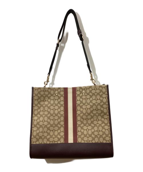 COACH（コーチ）COACH (コーチ) デンプシー トート 40 シグネチャー ジャカード ストライプ アンド コーチ パッチ ブラウンの古着・服飾アイテム
