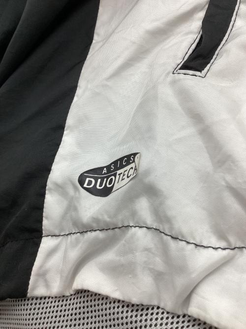 asics（アシックス）asics (アシックス) ナイロンジャケット イエロー×ブラック サイズ:Lの古着・服飾アイテム