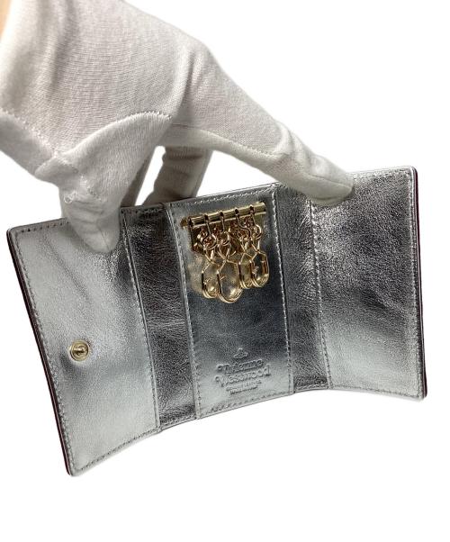 Vivienne Westwood（ヴィヴィアンウエストウッド）Vivienne Westwood (ヴィヴィアンウエストウッド) サフィアーノ 4連キーケース パープル 未使用品の古着・服飾アイテム