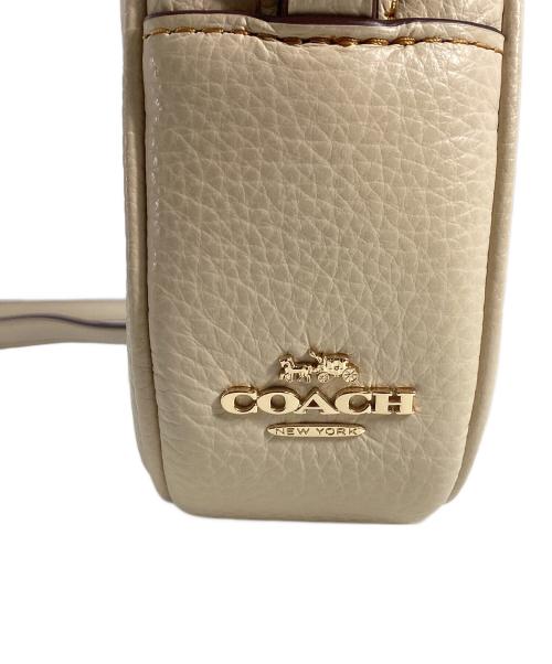 COACH（コーチ）COACH (コーチ) PEANUTS (ピーナッツ) COACH×PEANUTS　ミニ ジェイミー カメラ バッグ・スヌーピー カドル モチーフ アイボリーの古着・服飾アイテム