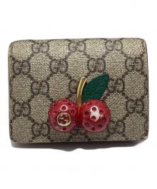 GUCCI（グッチ）の古着「GGスプリーム チェリー コンパクトウォレット」｜グレー×レッド