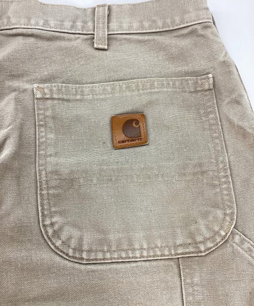 CarHartt（カーハート）CarHartt (カーハート) タックパンツ ベージュ サイズ:88.5㎝（W35）の古着・服飾アイテム