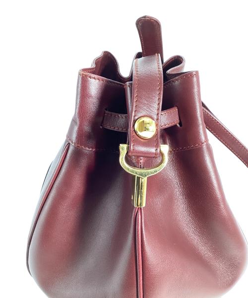 Cartier（カルティエ）Cartier (カルティエ) Cartier　マストライン　巾着ショルダーバッグ ボルドーの古着・服飾アイテム