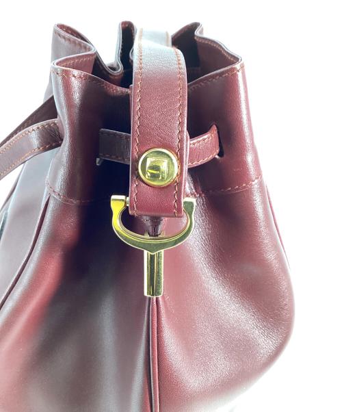 Cartier（カルティエ）Cartier (カルティエ) Cartier　マストライン　巾着ショルダーバッグ ボルドーの古着・服飾アイテム