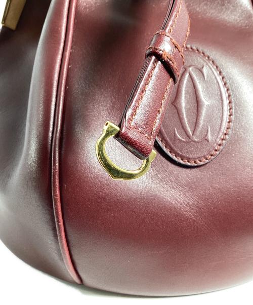 Cartier（カルティエ）Cartier (カルティエ) Cartier　マストライン　巾着ショルダーバッグ ボルドーの古着・服飾アイテム