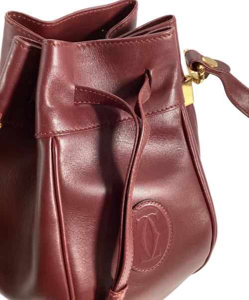 Cartier（カルティエ）Cartier (カルティエ) Cartier　マストライン　巾着ショルダーバッグ ボルドーの古着・服飾アイテム