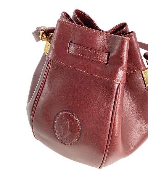 Cartier（カルティエ）Cartier (カルティエ) Cartier　マストライン　巾着ショルダーバッグ ボルドーの古着・服飾アイテム