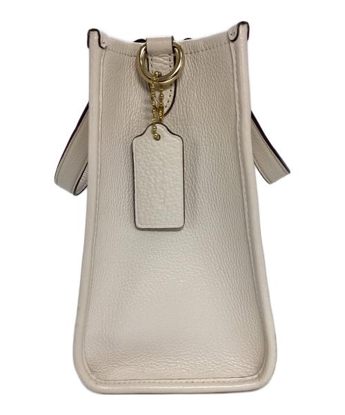 COACH（コーチ）COACH (コーチ) デンプシーキャリーオール アイボリーの古着・服飾アイテム