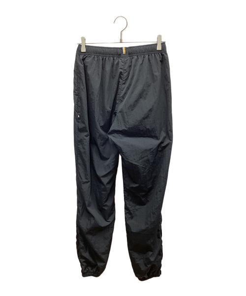 NEW BALANCE（ニューバランス）NEW BALANCE (ニューバランス) Black Out ウインドパンツ ブラック サイズ:M 未使用品の古着・服飾アイテム