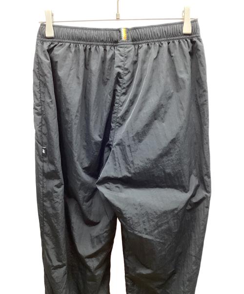 NEW BALANCE（ニューバランス）NEW BALANCE (ニューバランス) Black Out ウインドパンツ ブラック サイズ:M 未使用品の古着・服飾アイテム
