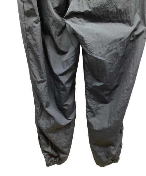 NEW BALANCE（ニューバランス）NEW BALANCE (ニューバランス) Black Out ウインドパンツ ブラック サイズ:M 未使用品の古着・服飾アイテム