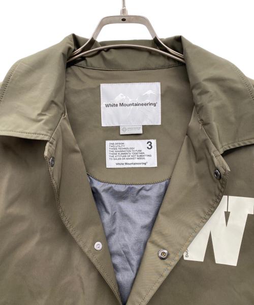 WHITE MOUNTAINEERING（ホワイトマウンテ二アニング）WHITE MOUNTAINEERING (ホワイトマウンテ二アニング) ウィンドストッパー コーチジャケット オリーブ サイズ:3の古着・服飾アイテム