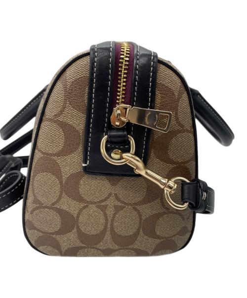 COACH（コーチ）COACH (コーチ) Disney (ディズニー) ローアン サッチェル・シグネチャー キャンバス・パッチ ブラウンの古着・服飾アイテム