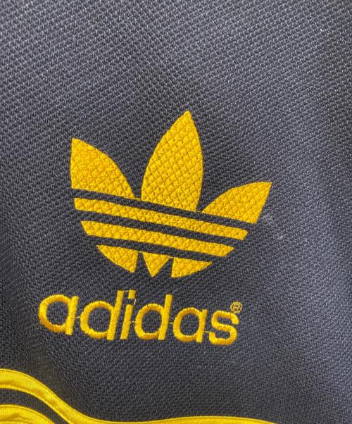 adidas（アディダス）adidas (アディダス) 90‘S ヴィンテージ アメフトシャツ ブラック×イエロー サイズ:Mの古着・服飾アイテム