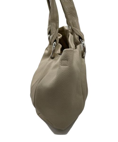 FURLA（フルラ）FURLA (フルラ) ハンドバッグ ベージュの古着・服飾アイテム