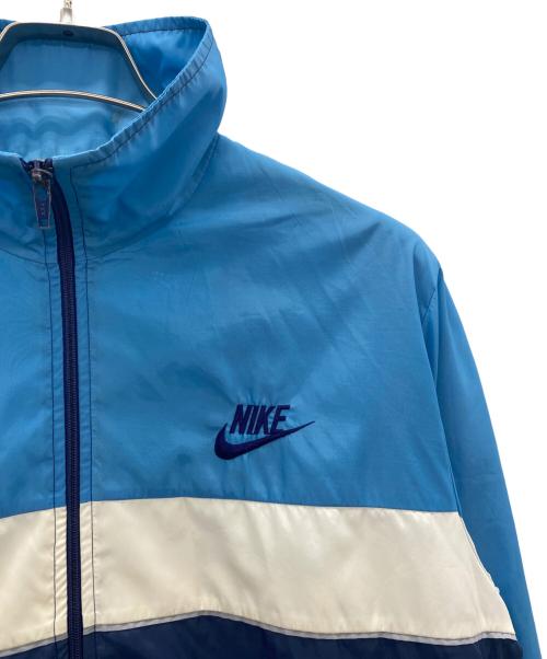 NIKE（ナイキ）NIKE (ナイキ) ナイロンジャケット ブルー×ネイビー サイズ:SIZE Mの古着・服飾アイテム