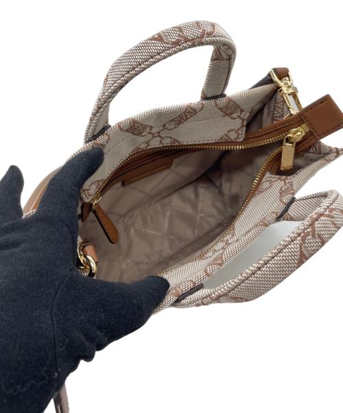 MICHAEL KORS（マイケル・コース）MICHAEL KORS (マイケル・コース) メッセンジャーバッグ ベージュの古着・服飾アイテム