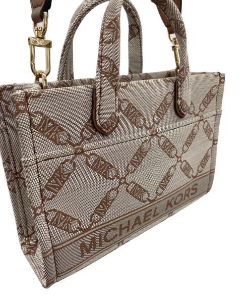 MICHAEL KORS（マイケル・コース）MICHAEL KORS (マイケル・コース) メッセンジャーバッグ ベージュの古着・服飾アイテム