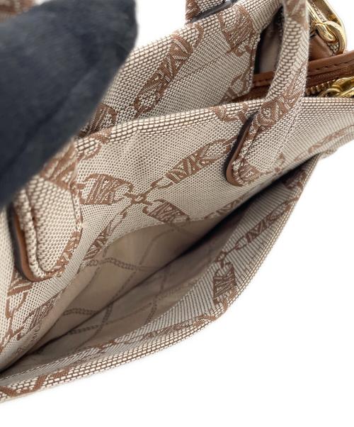 MICHAEL KORS（マイケル・コース）MICHAEL KORS (マイケル・コース) メッセンジャーバッグ ベージュの古着・服飾アイテム