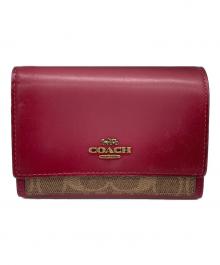 COACH（コーチ）の古着「2つ折り財布」｜レッド