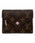 LOUIS VUITTON（ルイ ヴィトン）の古着「ボルトフォイユ・ヴィクトリーヌ」｜ブラウン×ピンク