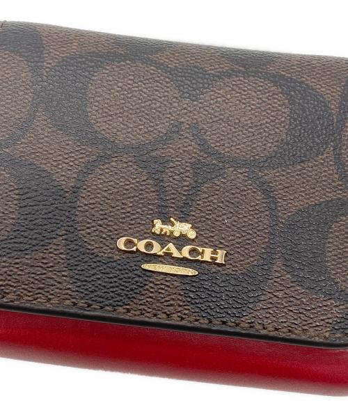 COACH（コーチ）COACH (コーチ) コンパクトウォレット ブラウン×レッドの古着・服飾アイテム