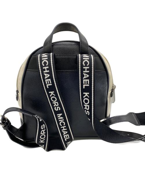 MICHAEL KORS（マイケル・コース）MICHAEL KORS (マイケル・コース) リュック ブラック×ホワイトの古着・服飾アイテム