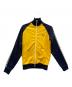 FRED PERRY（フレッドペリー）の古着「トラックジャケット」｜イエロー×ネイビー