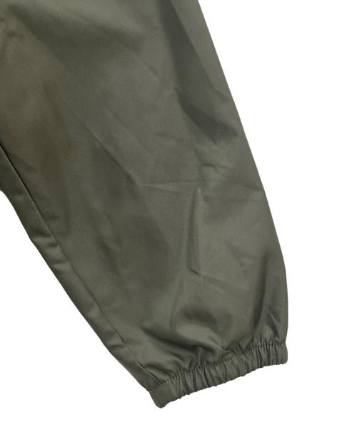 THE NORTH FACE（ザ ノース フェイス）THE NORTH FACE (ザ ノース フェイス) コーチジャケット ブラック×オリーブ サイズ:XL 未使用品の古着・服飾アイテム