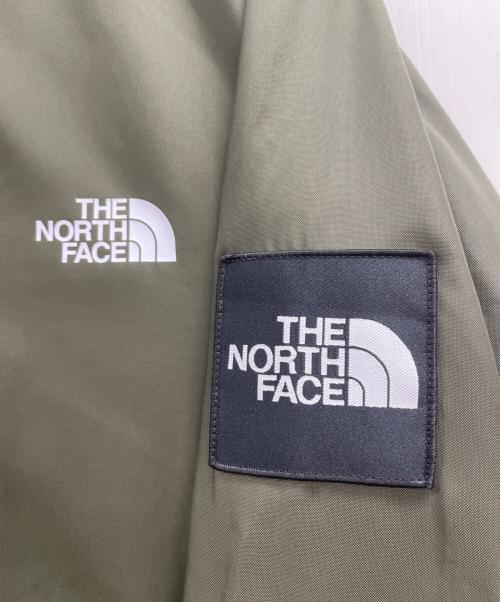 THE NORTH FACE（ザ ノース フェイス）THE NORTH FACE (ザ ノース フェイス) コーチジャケット ブラック×オリーブ サイズ:XL 未使用品の古着・服飾アイテム