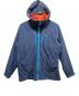 Patagonia（パタゴニア）の古着「ナイロンジャケット」｜オレンジ×ネイビー