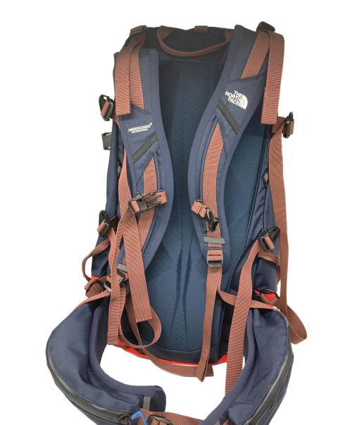 THE NORTH FACE（ザ ノース フェイス）THE NORTH FACE (ザ ノース フェイス) UNDERCOVER (アンダーカバー) ユーティリティ バックパック レッド×ネイビーの古着・服飾アイテム