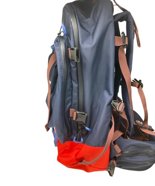 THE NORTH FACE（ザ ノース フェイス）THE NORTH FACE (ザ ノース フェイス) UNDERCOVER (アンダーカバー) ユーティリティ バックパック レッド×ネイビーの古着・服飾アイテム