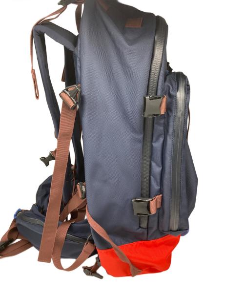THE NORTH FACE（ザ ノース フェイス）THE NORTH FACE (ザ ノース フェイス) UNDERCOVER (アンダーカバー) ユーティリティ バックパック レッド×ネイビーの古着・服飾アイテム