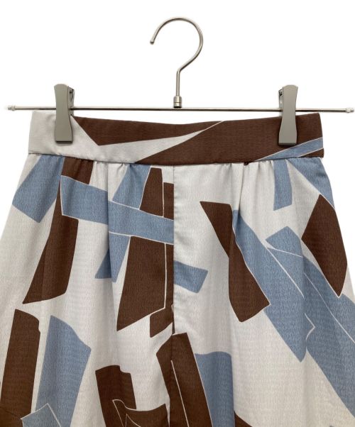 COCODEAL（ココディール）COCODEAL (ココディール) 幾何プリントアシメティアードイレヘムスカート ブラウン×ブルー サイズ:SIZE 40の古着・服飾アイテム