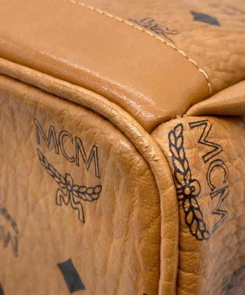 MCM（エムシーエム）MCM (エムシーエム) ヴィセトス　スタッズ　バックパックミニ ブラウンの古着・服飾アイテム