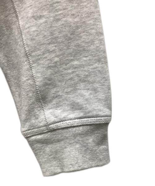 CarHartt（カーハート）CarHartt (カーハート) アメリカンスクリプトフーデッドスウェット ライトグレー サイズ:Sの古着・服飾アイテム