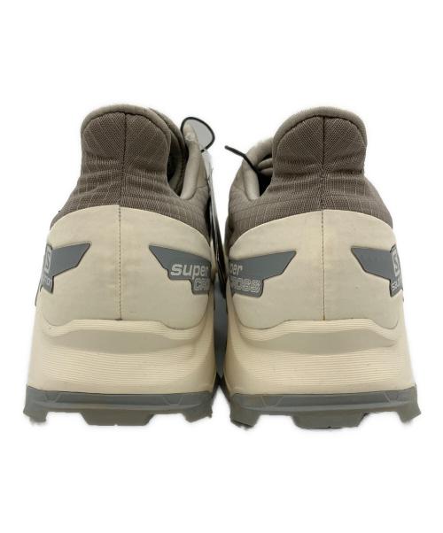 SALOMON（サロモン）SALOMON (サロモン) トレイルランニングシューズ ベージュ サイズ:27 未使用品の古着・服飾アイテム