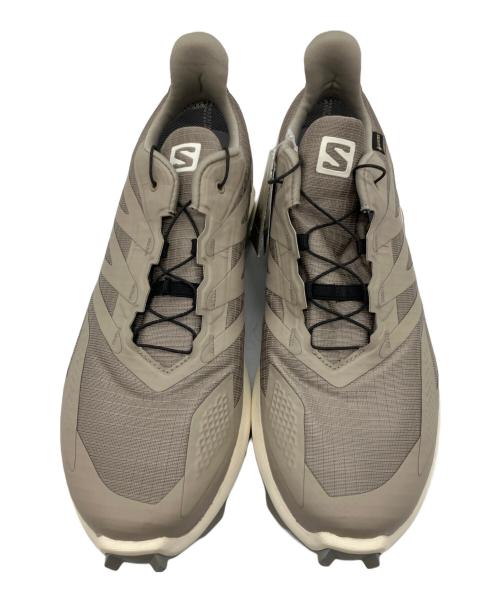 SALOMON（サロモン）SALOMON (サロモン) トレイルランニングシューズ ベージュ サイズ:27 未使用品の古着・服飾アイテム