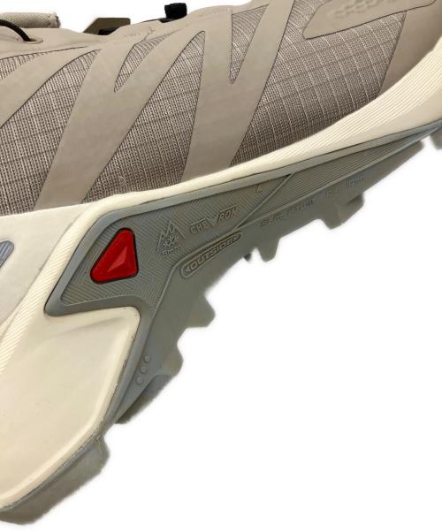 SALOMON（サロモン）SALOMON (サロモン) トレイルランニングシューズ ベージュ サイズ:27 未使用品の古着・服飾アイテム