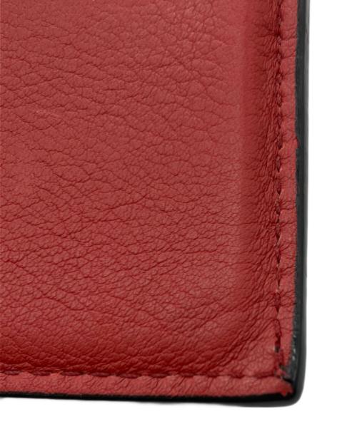Salvatore Ferragamo（サルヴァトーレ フェラガモ）Salvatore Ferragamo (サルヴァトーレ フェラガモ) マイクロスタッズロゴウォレット ブラック×レッドの古着・服飾アイテム