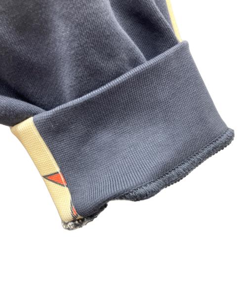 little sunny bite（リトルサニーバイト）little sunny bite (リトルサニーバイト) STRANGER THINGS (ストレンジャーシングス) スウェット グレー×イエロー サイズ:Mの古着・服飾アイテム