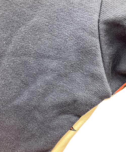 little sunny bite（リトルサニーバイト）little sunny bite (リトルサニーバイト) STRANGER THINGS (ストレンジャーシングス) スウェット グレー×イエロー サイズ:Mの古着・服飾アイテム