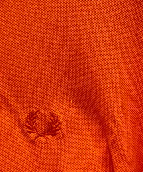 FRED PERRY（フレッドペリー）FRED PERRY (フレッドペリー) 半袖ポロシャツ オレンジ サイズ:42の古着・服飾アイテム